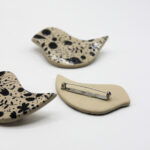 Broszka ceramiczna "Kwiatowy Ptak"